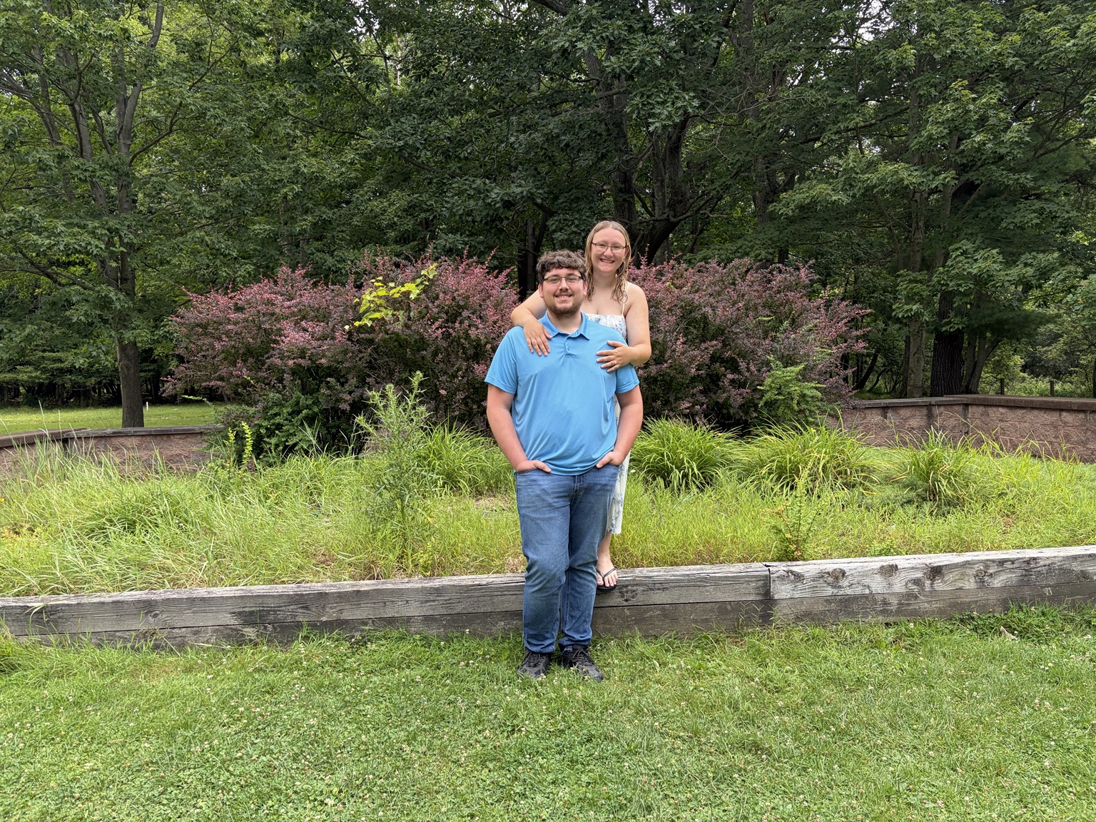 Levi and Addy posing together outdoors